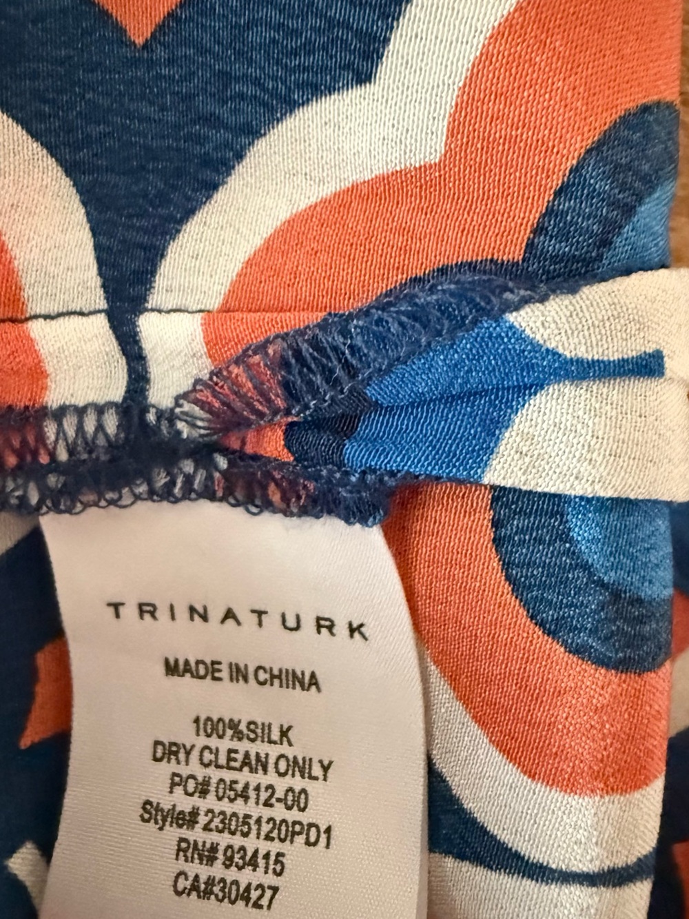 Trina Turk Silk Navy Orange & White Geo-Print Split-Neck Blouse - Picture 5 of 5